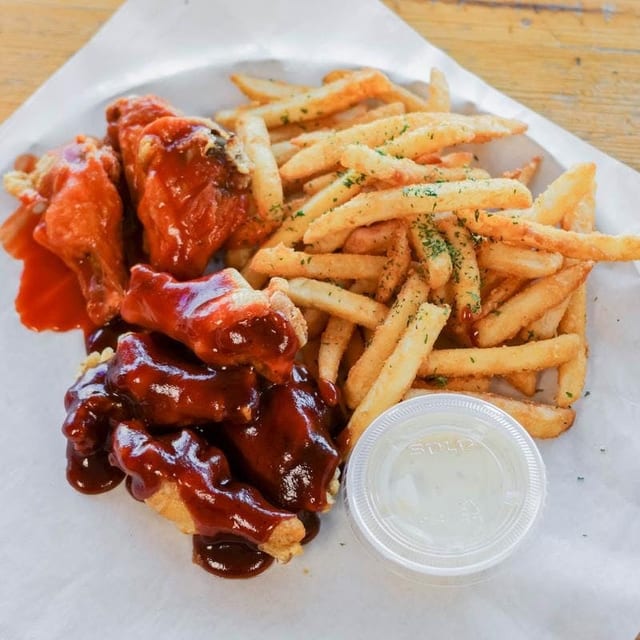 Chicken Wings with Fries.